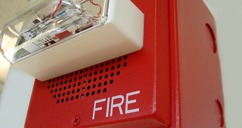 Close-up of fire alarm with speaker and strobe