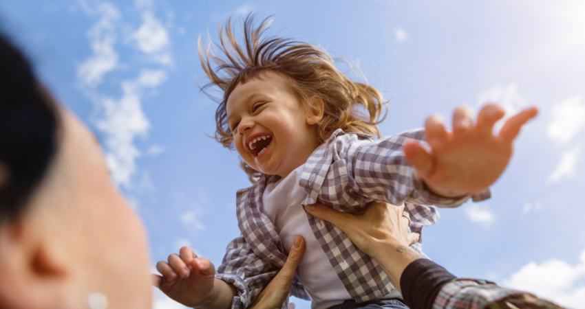 A mom playing with their child