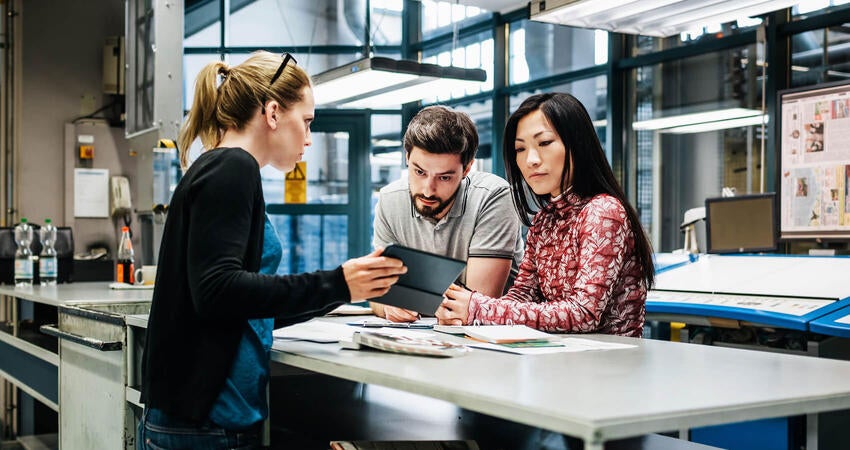 Teammates working together