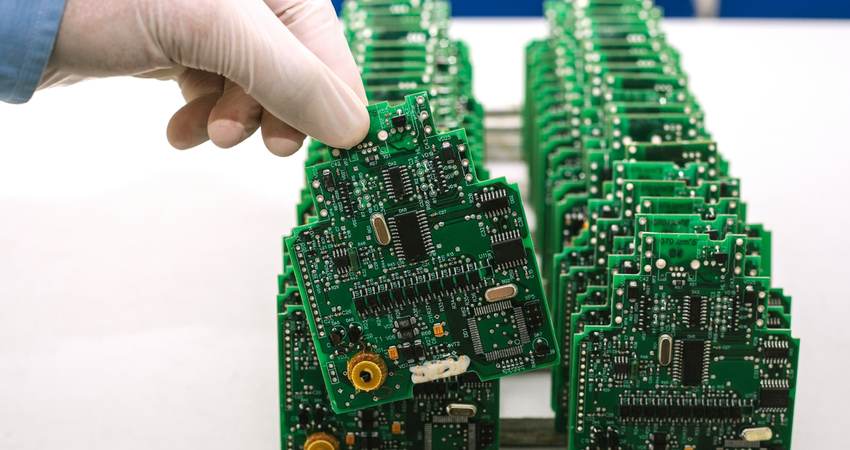 Rows of circuit boards lined up neatly