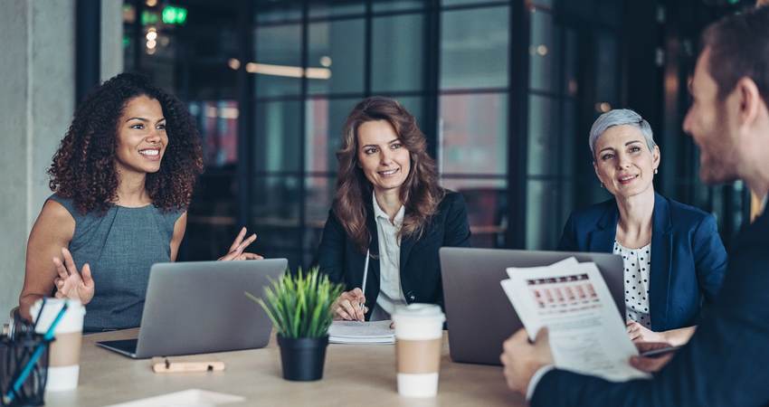 People having a meeting in a conference room