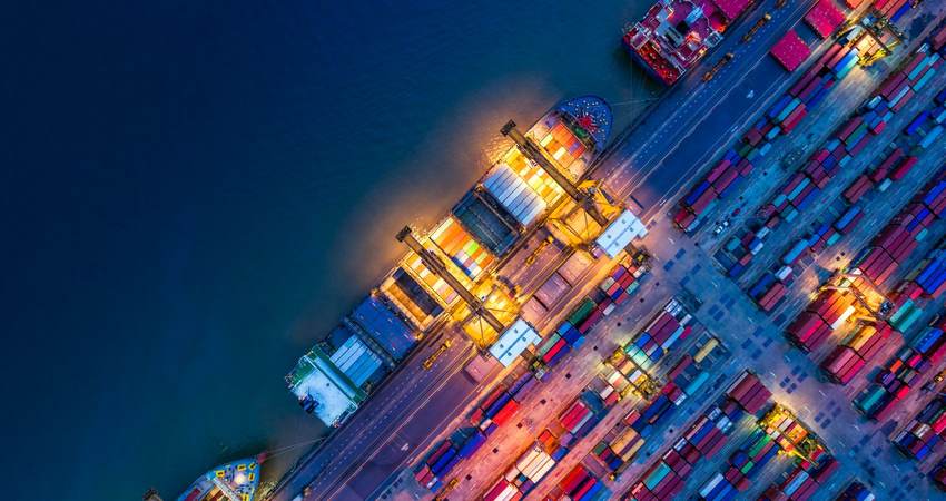 Container ship in import export and business logistics, by crane, trade port, shipping cargo to harbor.
