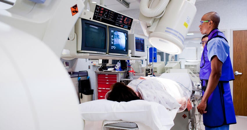 Person undergoing an x-ray in lab