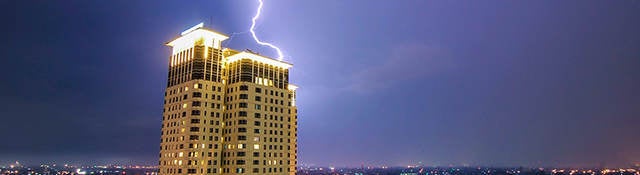 lightning striking building