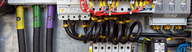 Electrical panel at a assembly line factory. Controls and switches