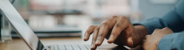 man using a laptop computer