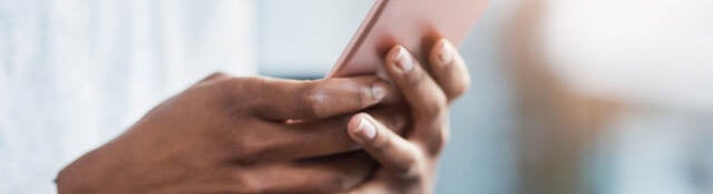 A businessperson using a mobile phone