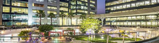 Exterior of an office building complex at twilight