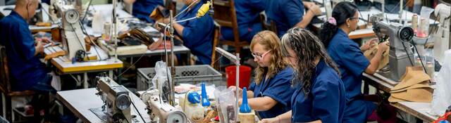 Manual workers working at a factory.