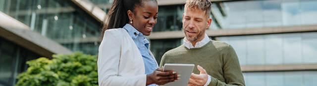 A couple working together on a tablet