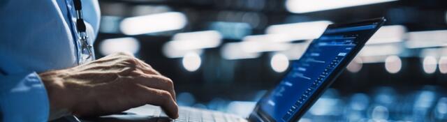 Man holding laptop