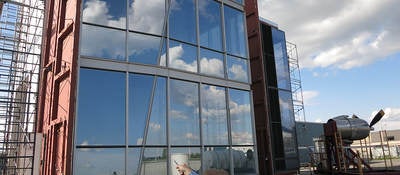 Contractors inspecting building