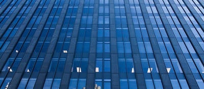 Looking up at a skyscraper. 