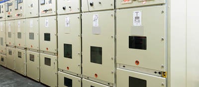 A picture of power distribution equipment inside a power plant. 