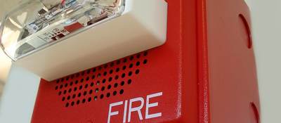 Close-up of fire alarm with speaker and strobe