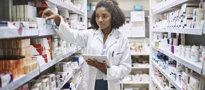 pharmacist with a tablet