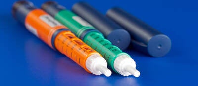 image of colorful syringes used for dispensing pharmaceuticals