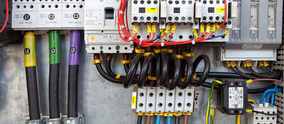 Electrical panel at a assembly line factory. Controls and switches