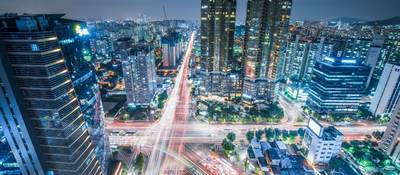 High Angle View Of Cityscape Lit Up At Night