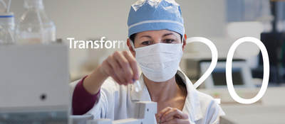 Transform 2020: Masked medical scientist working in a lab