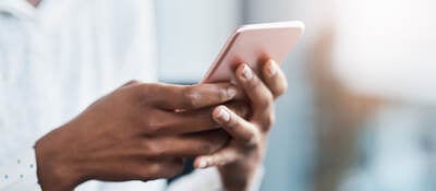 A businessperson using a mobile phone