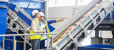 workers in a recycling factory