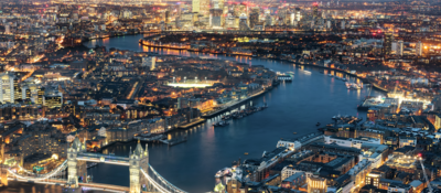 High Angle View Of Tower Bridge Over Thames River In Illuminated City At Night