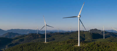 wind turbines on a hill