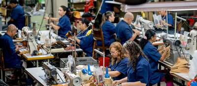 Laborers working at a textile factory.