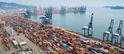 Rows of cargo carriers at a maritime shipping terminal