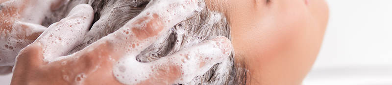 Woman’s hair being shampooed