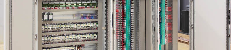 The inside of an industrial control panel board.