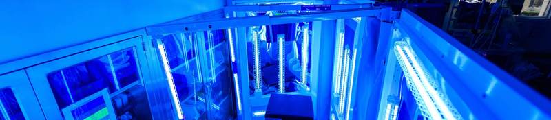 Hospital examination table being treated with UV light for sterilization