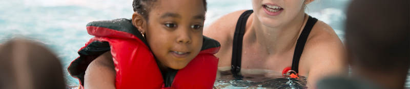 Children playing in swimming pool