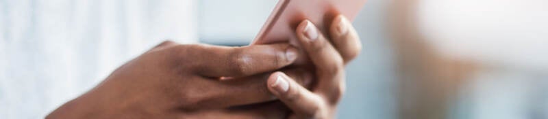 A businessperson using a mobile phone