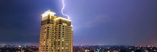 lightning striking building