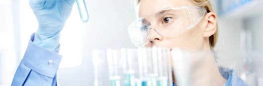 Photo of young woman working in laboratory