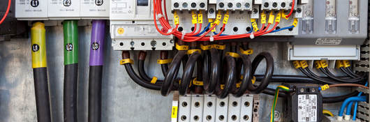 Electrical panel at a assembly line factory. Controls and switches