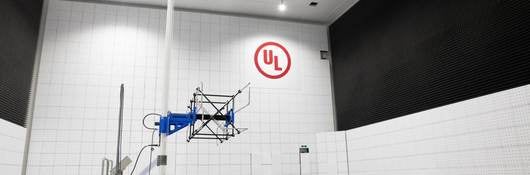Large EMC chamber with antenna in laboratory with red UL logo