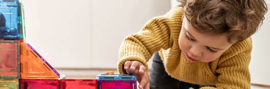 A child playing with a toy