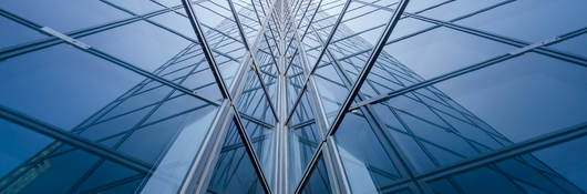 Modern blue glass building mirror reflections