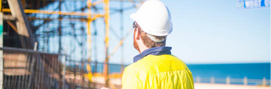 Construction worker with clipboard