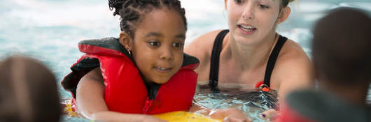 Children playing in swimming pool