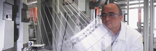 Lab tech conducting impact test