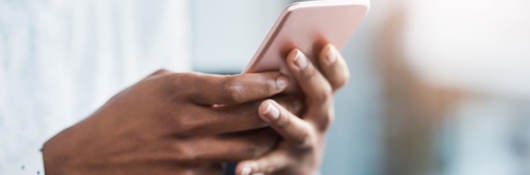 A businessperson using a mobile phone