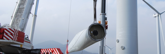 Workers doing wind turbine maintenance 