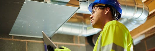 Inspector performing an air conditioning appliance diagnostic