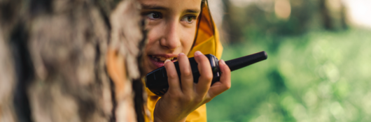 Girl playing with connected toys