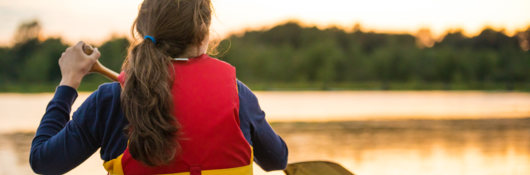 Woman wearing personal flotation device