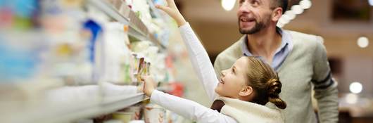 Father and daughter at the supermarket